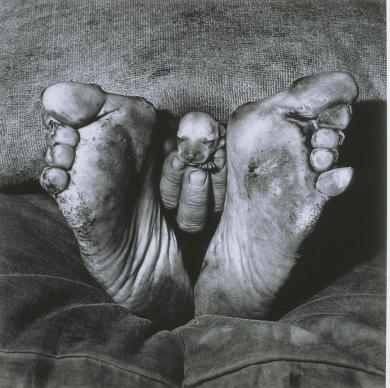 Main image of the artwork Puppy between feet