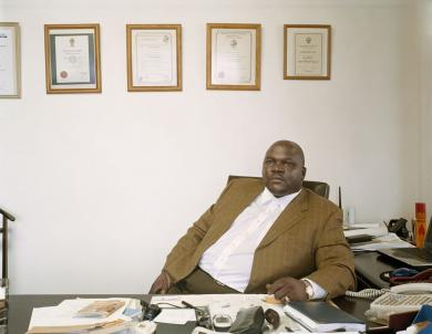 Main image of the artwork George Seitisho, Municipal Manager, Plettenberg Bay Local Municipality, Plettenbeg Bay, Eastern Cape. 8 October 2004. Serie Municipal Officials